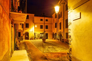 Fototapeten Evening cityscape in the town of Montemarcello La Spezia Liguria Italy © Paolo Borella