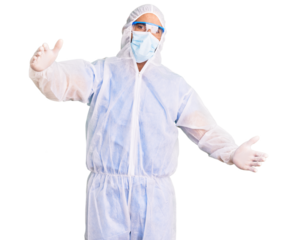 Young hispanic man wearing doctor protection coronavirus uniform and medical mask looking at the camera smiling with open arms for hug. cheerful expression embracing happiness.