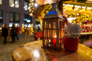 Candle lantern decoration on table at Christmas market