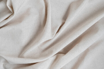 Abstract neutral minimalist aesthetic background, messy crumpled beige linen fabric texture with...