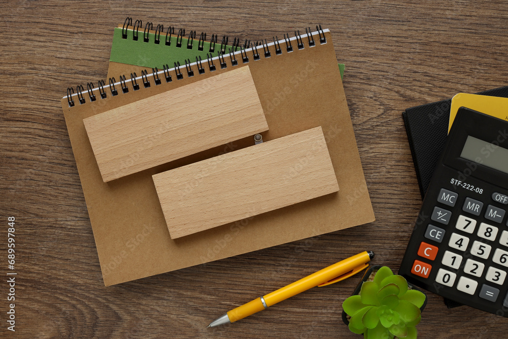 Aufkleber two empty wooden blocks on a wooden background for your text. free space for business concept templa