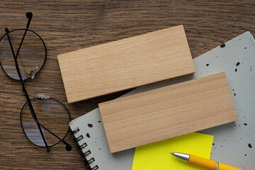 business concept. notepad stickers and glasses. wooden blocks