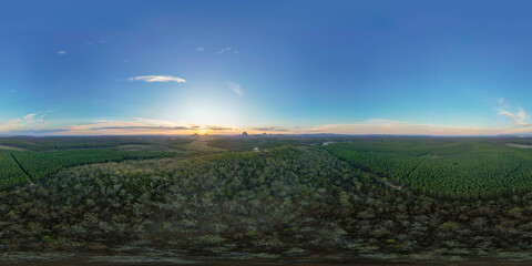 Tourists visit the Wildhorse scenic lookout for sunset panoramic views across the Glasshouse Mountains and the Sunshine Coast in Queensland