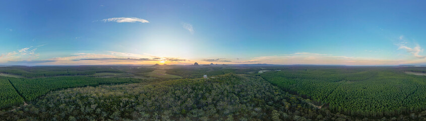 Tourists visit the Wildhorse scenic lookout for sunset panoramic views across the Glasshouse Mountains and the Sunshine Coast in Queensland