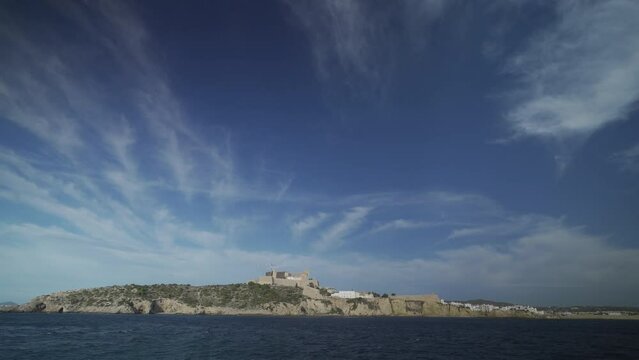 Wide-Angle View of Ibiza s Ancient Fortress Dalt Vila from the Sea