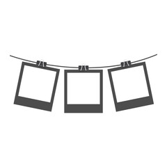Polaroid photo frame with paper clips