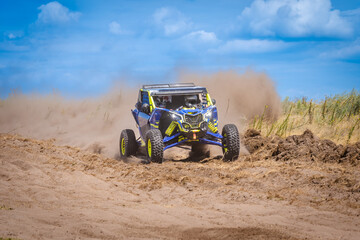 Naklejka premium Amazing view on sandy active UTV. Extreme ride on 4x4