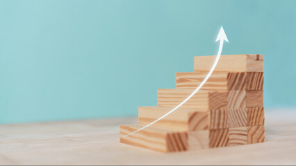 White arrows moving up on wooden blocks, Business Concept Growth, Conceptual Business Finance...