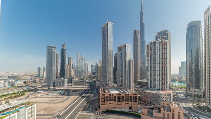 Naklejka na ściany i meble Aerial view of Dubai Downtown skyline with many towers timelapse.