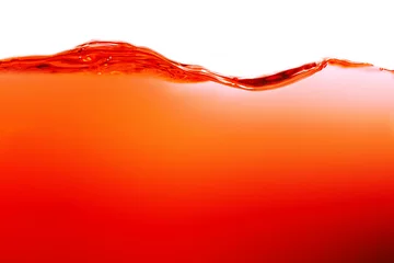 Schilderijen op glas Close up bright orange juice texture for health and nature waves © watchara
