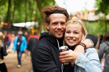 Happy couple, portrait and outdoor festival for love, care or support at party, DJ event or music. Man and woman hug with smile in embrace, affection or trust for festive or summer celebration - obrazy, fototapety, plakaty