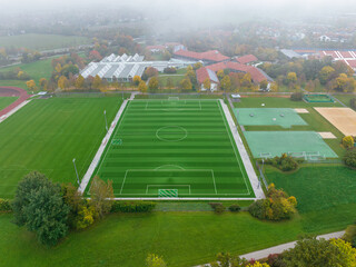 Aerial View of a Green, Well-Maintained Soccer Field in Autumn © allessuper_1979