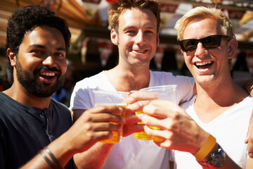 Happy man, portrait and friends cheers at music festival, bar or event for summer party or DJ concert. Male person or group smile with beer in toast for friendship at carnival or outdoor celebration