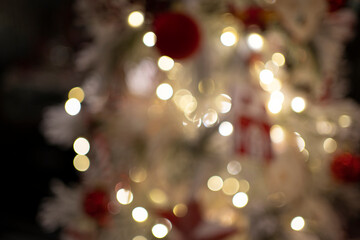 Bright and blurred lights provide a festive illumination effect, adding sparkle and warmth to the...