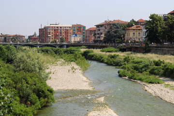 Fototapeta na wymiar Parma River as it passes through the city of Parma in Italy