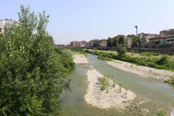 Fototapeta na wymiar Parma River as it passes through the city of Parma in Italy
