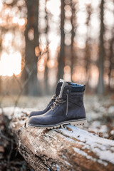 Leather hiking boot. Autumn and winter fashion footwear. Waterproof ankle shoes for outdoor activity