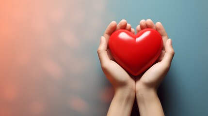 A pair of human hands gently cradling a vibrant red heart symbol, representing support for heart disease awareness and the importance of cardiovascular health care.