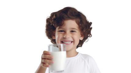 Happy kid smiling and drinking a glass of milk.