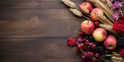 Fototapeta na wymiar autumn wheat accompanied by pears, plums and pumpkins on wooden background with copy space