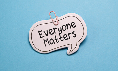 Everyone Matters text on card isolated on blue background