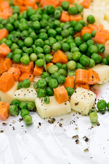 Papas, zanahorias y arvejas