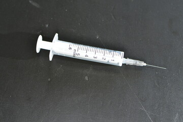 Injection Syringe medicine needle Background black