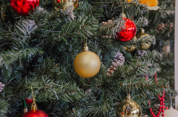 Obraz na płótnie Canvas Background of Christmas tree colorful toys on Christmas tree