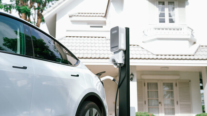 Electric vehicle technology utilized to residential area or home charging station for EV car...