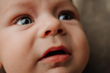 Close up of a baby boy's face: Caucasian male