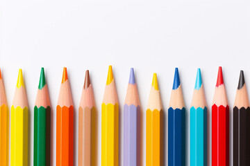 Colorful pencils on white background with copy space