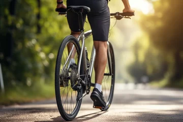 Foto op Aluminium sporty man with a bicycle outdoors, cycle sportsman, cyclist closeup view, cycle sports, sports cyclist closeup © MH