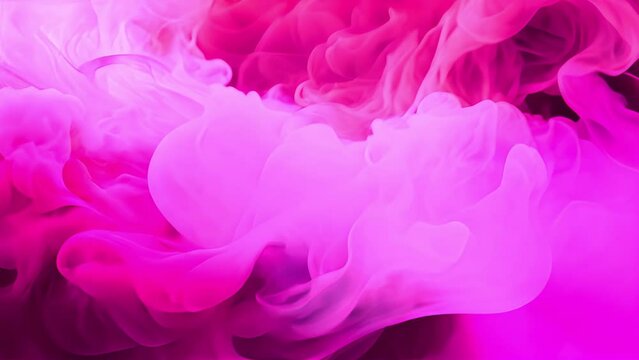 Pink purple smoke moving and swirling around. Magic mixing of color. Cloud of silky ink in water isolated on blue background. Colorful ink in water, ink drop. Purple, blue, pink.
