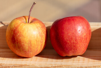 Two apples on a wooden table
