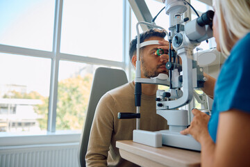 Eye test vision of patient at ophthalmologist's office.