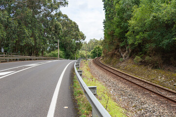 Fototapeta na wymiar road parallel to train track