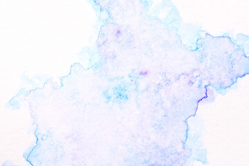 Abstract liquid art background. Blue purple watercolor translucent blots on white paper.