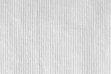 white corduroy fabric texture used as background.  clean fabric background of soft and smooth textile material. cloth, velvet, .luxury white tone for silk..