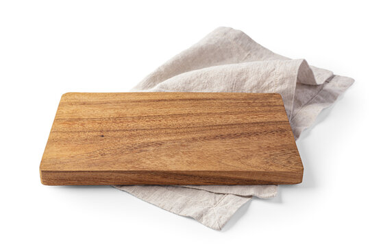 Wood plate on linen napkin isolated on white background