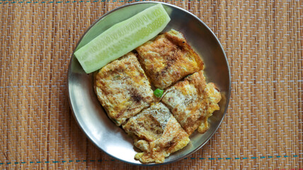 Egg Toast and cucumber slice
