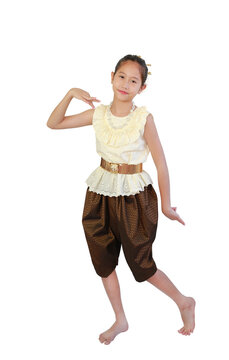 Beautiful Asian young girl kid wearing traditional Thai style dress with native dancing posture isolated on white background. Image full length with clipping path.