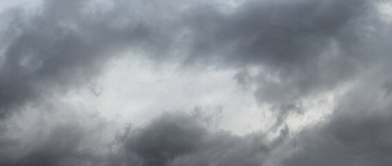 Dark oppressive rainy sky with gray clouds - obrazy, fototapety, plakaty