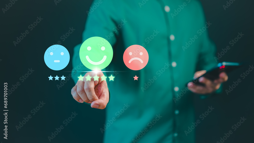 Poster client hand touch virtual screen on happy smile face icon to give satisfaction in service. online re