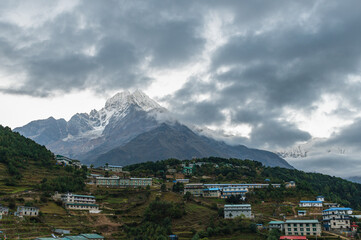 View of Namche Bazar and Thamserku mountain during Everest base camp EBC or Three passes trekking, Sagarmatha national park, Nepal.