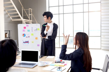Achievement successful beautiful businesswoman shares experience success, gives presentation at conference meeting desk, businesspeople have discussion about project work in office workplace