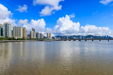 Beautiful coastline and modern residential area buildings scenery in Zhuhai, Guangdong Province, China.