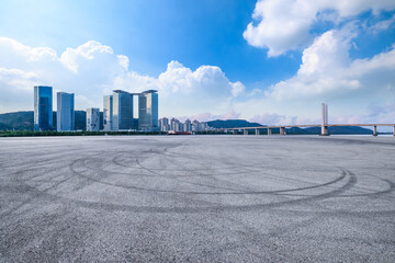 Asphalt road square and city skyline with modern buildings scenery in Zhuhai, Guangdong province, China.