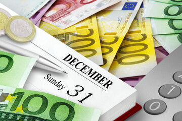 Calendar 2023 December 31 Sunday New Years Eve and calculator with Euro banknotes