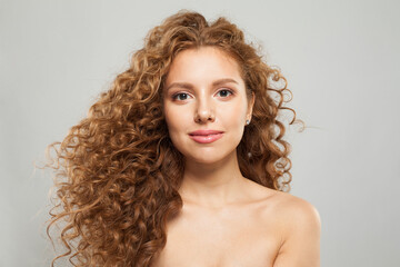 Perfect woman fashion model with long wavy hairstyle, natural makeup and clear skin. Haircare,...