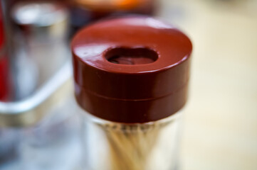 Close-up of the tooth-pick holder, the tool help picking the food.